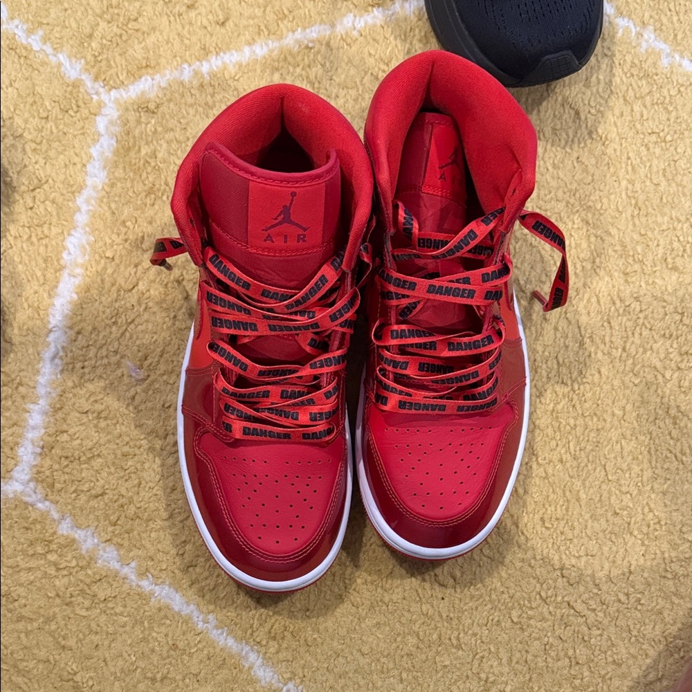 Jordan Women’s Red High-Top Sneakers